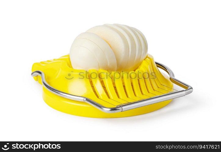 Boiled egg in the egg slicer isolated on a white background. Boiled egg in the egg slicer.