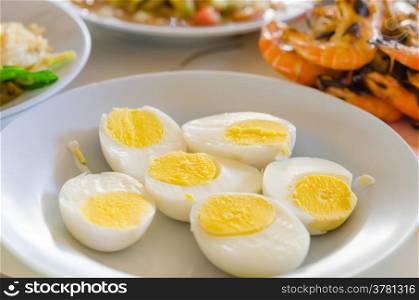 boiled eggs . close up slice of boiled eggs on dish