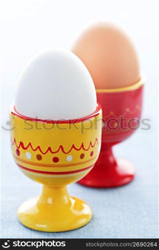 Boiled eggs in cups