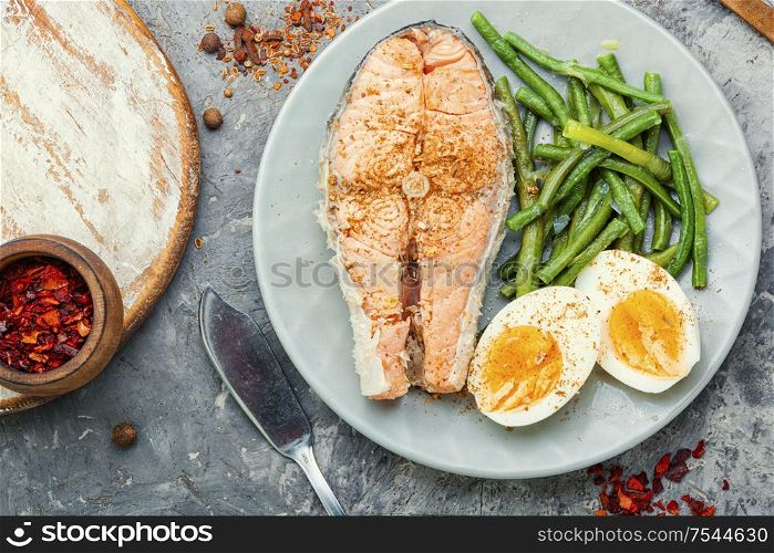Boiled fish with asparagus and egg.Dietary salmon,boiled salmon. Boiled salmon steak