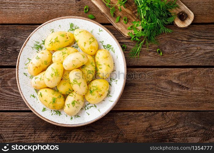 Boiled new potato with butter, dill and green onion