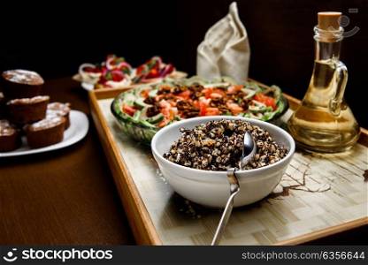 boiled rice with raisins and honey with oil and salad