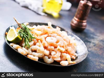 boiled shrimps with pepper and salt on plate