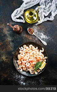 boiled shrimps with pepper and salt on plate