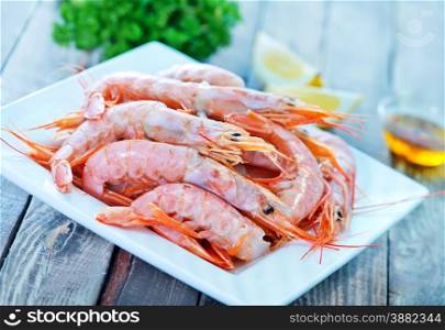boiled shrimps with salt on the plate