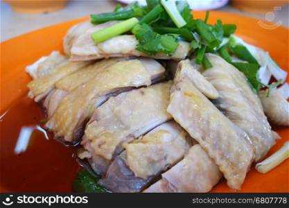 Boiled whole chicken cut into sliced portions. Ipoh famous food