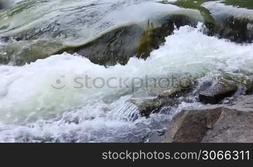 boiling water of fast mountain river