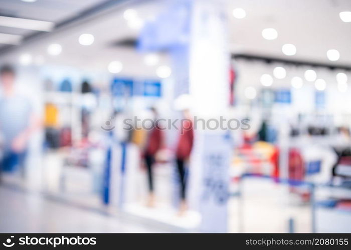 Bokeh abstract blur light of inside shopping complex Department store background