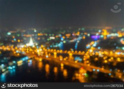 Bokeh background of skyscraper buildings in city with lights, Blurry photo at night time. 4K cityscape VDO