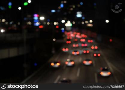 Bokeh blur of traffic lights in city at night