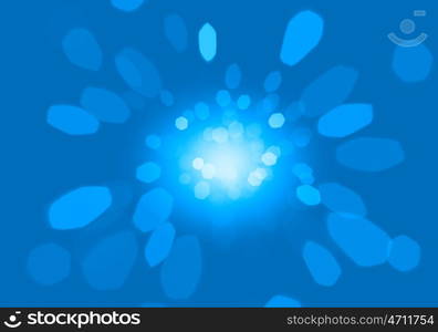 Bokeh lights. Abstract background image of blue bokeh lights and beams