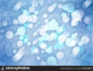 Bokeh lights. Abstract background image of blue bokeh lights and beams