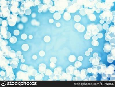 Bokeh lights. Abstract background image of blue bokeh lights and beams