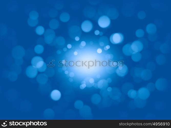 Bokeh lights. Abstract background image of blue bokeh lights and beams