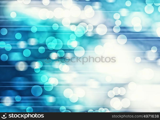 Bokeh lights. Abstract background image of blue bokeh lights and beams