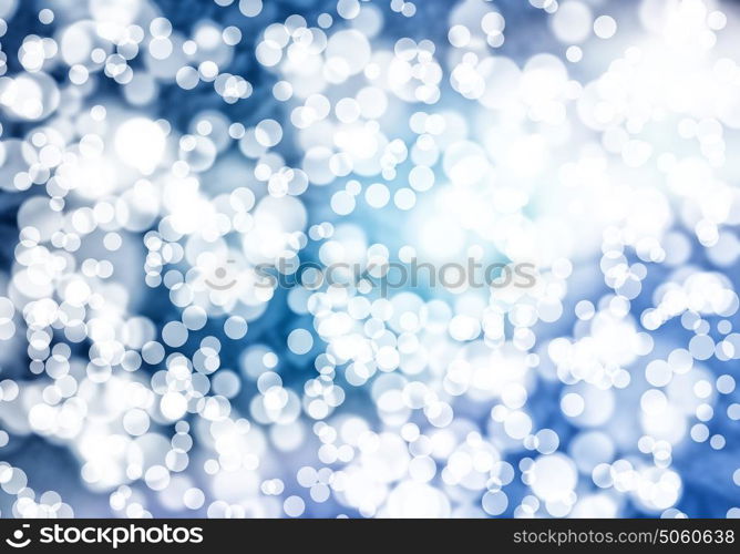 Bokeh lights. Abstract background image of blue bokeh lights and beams