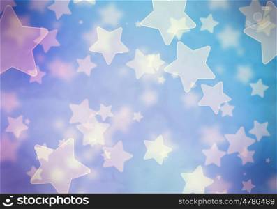 Bokeh lights. Abstract background image of blue stars lights and beams