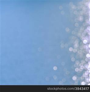 Bokeh lights abstract shining on sea blue background