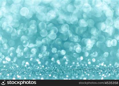 Bokeh lights background. Abstract background with blue shiny glitter bokeh lights