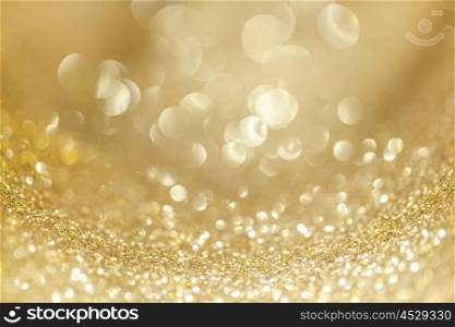 Bokeh lights background. Abstract background with golden shiny glitter bokeh lights
