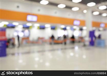Bokeh of check-in counters in airport - defocused background