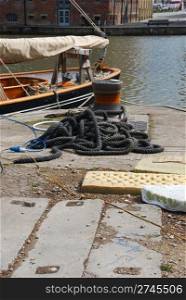 bollard and mooring ropes at Gloucester docks, England