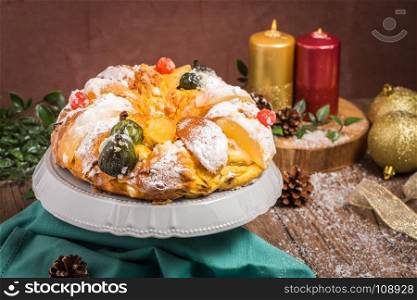 Bolo do Rei or King's Cake, Made for Christmas, Carnavale or Mardi Gras with Present Wrapping in Background