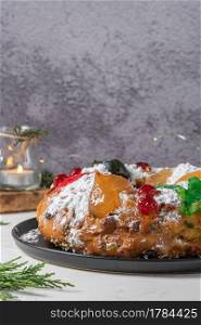 Bolo Rei or King’s Cake is a traditional Xmas cake with fruits raisins nut and icing  on kitcthen countertop. Is made for Christmas, Carnavale or Mardi Gras
