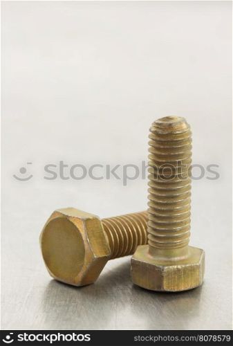 bolts tool at metal background texture