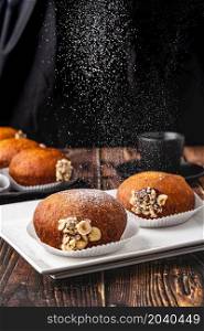 Bombolone or bomboloni is an Italian filled donut and snack food. German donuts - krapfen or berliner - filled with jam and chocolate