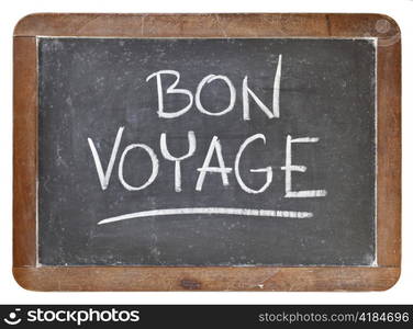 bon voyage - travel or farewell concept - white chalk handwriting on isolated vintage slate blackboard