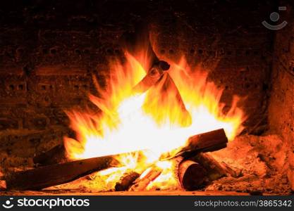 bonfire and flames in a fireplace