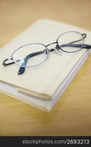 Book and glasses