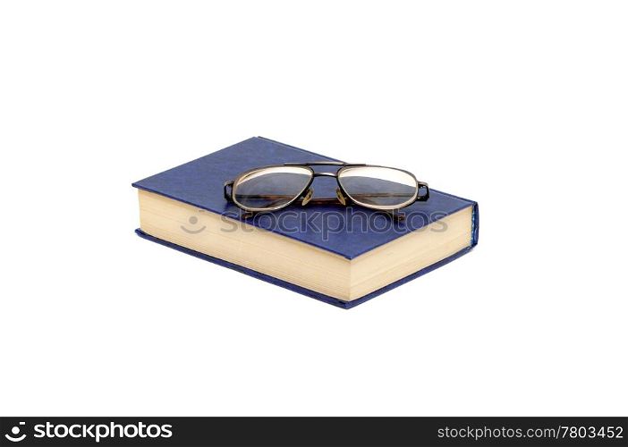 book and glasses isolated on a white background
