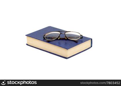 book and glasses isolated on a white background