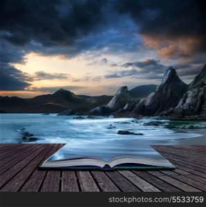 Book concept Stunning mountain and sea sunset landscape