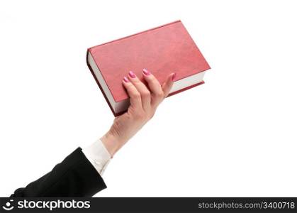 book in hand isolated on a white