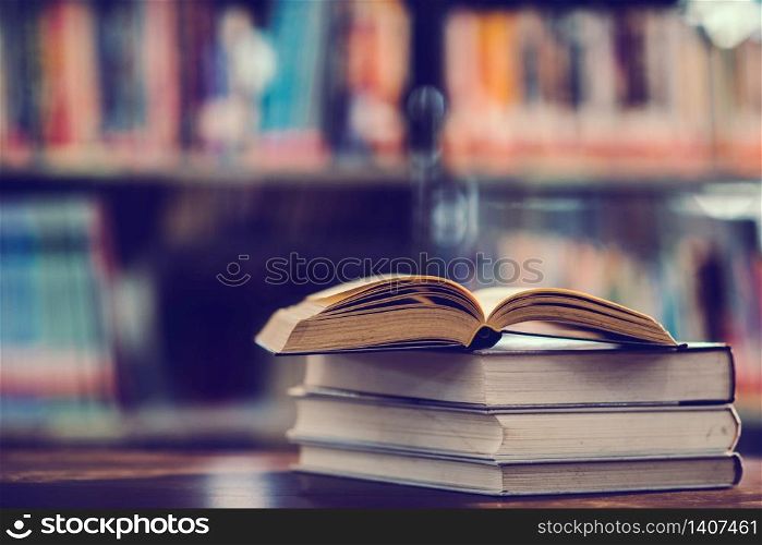 Book in library with open textbook,education learning concept