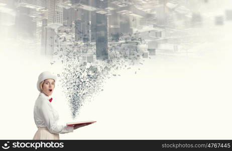 Book that blow up your imagination. Young woman in white hat with opened book in hands and characters flying out