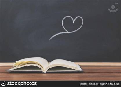 Books and heart shapes on the blackboard love reading