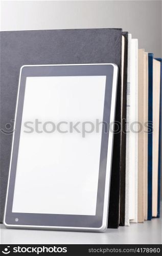 books and modern tablet computer, concept of evolution