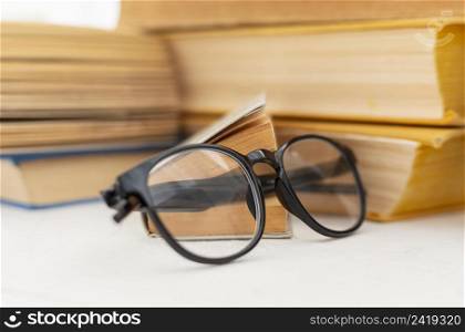 books arrangement with glasses