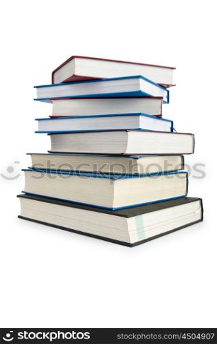 Books in high stack isolated on white