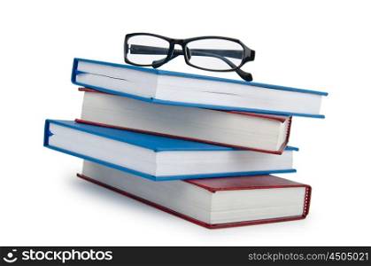 Books in high stack isolated on white