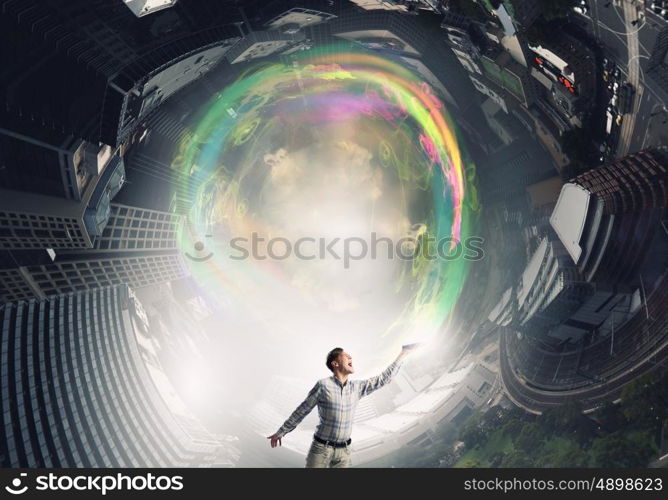 Books let you rise above the rest. Young handsome man in casual reaching hand with book