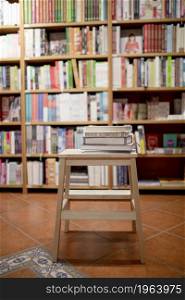 books lying ladder bookstore. High resolution photo. books lying ladder bookstore. High quality photo