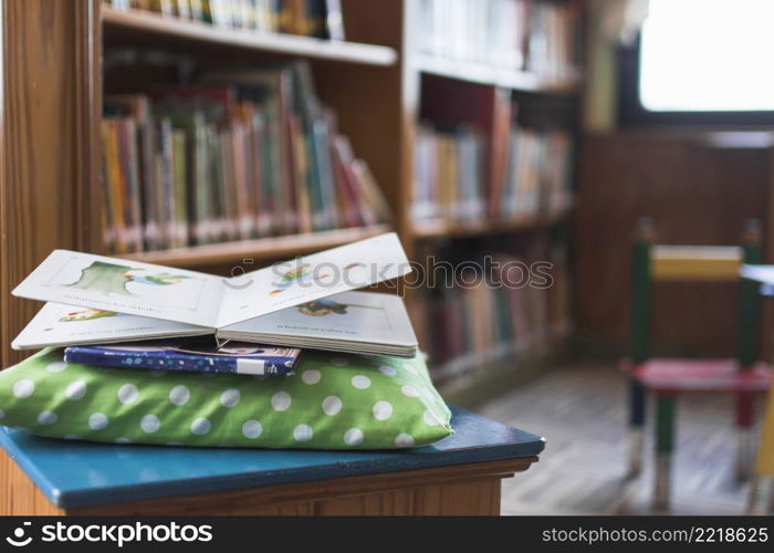 books lying pillow library