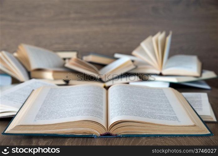 books on a wooden background
