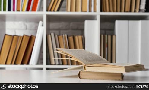 books shelf table arrangement. High resolution photo. books shelf table arrangement. High quality photo