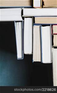books stacked blue background